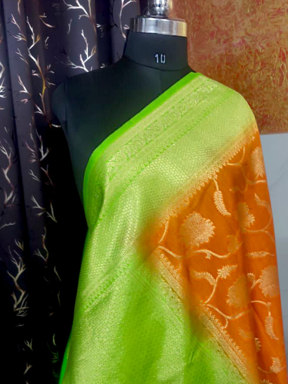 orange silk saree with shimmering zari embroidery for weddings and festive occasions"