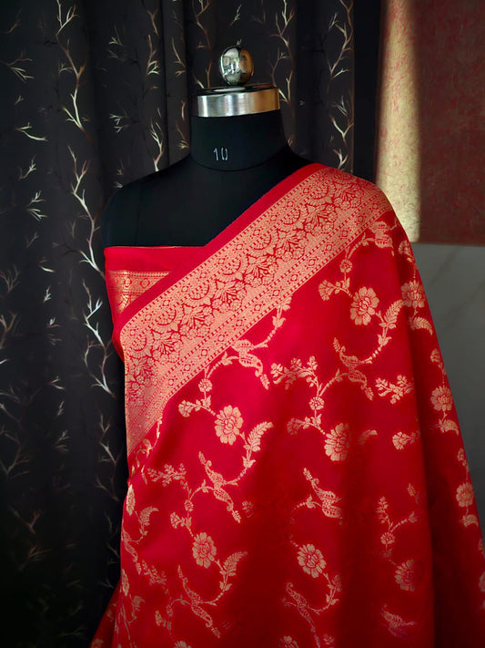 “Red silk saree with elegant traditional design, perfect for weddings and festive occasions”