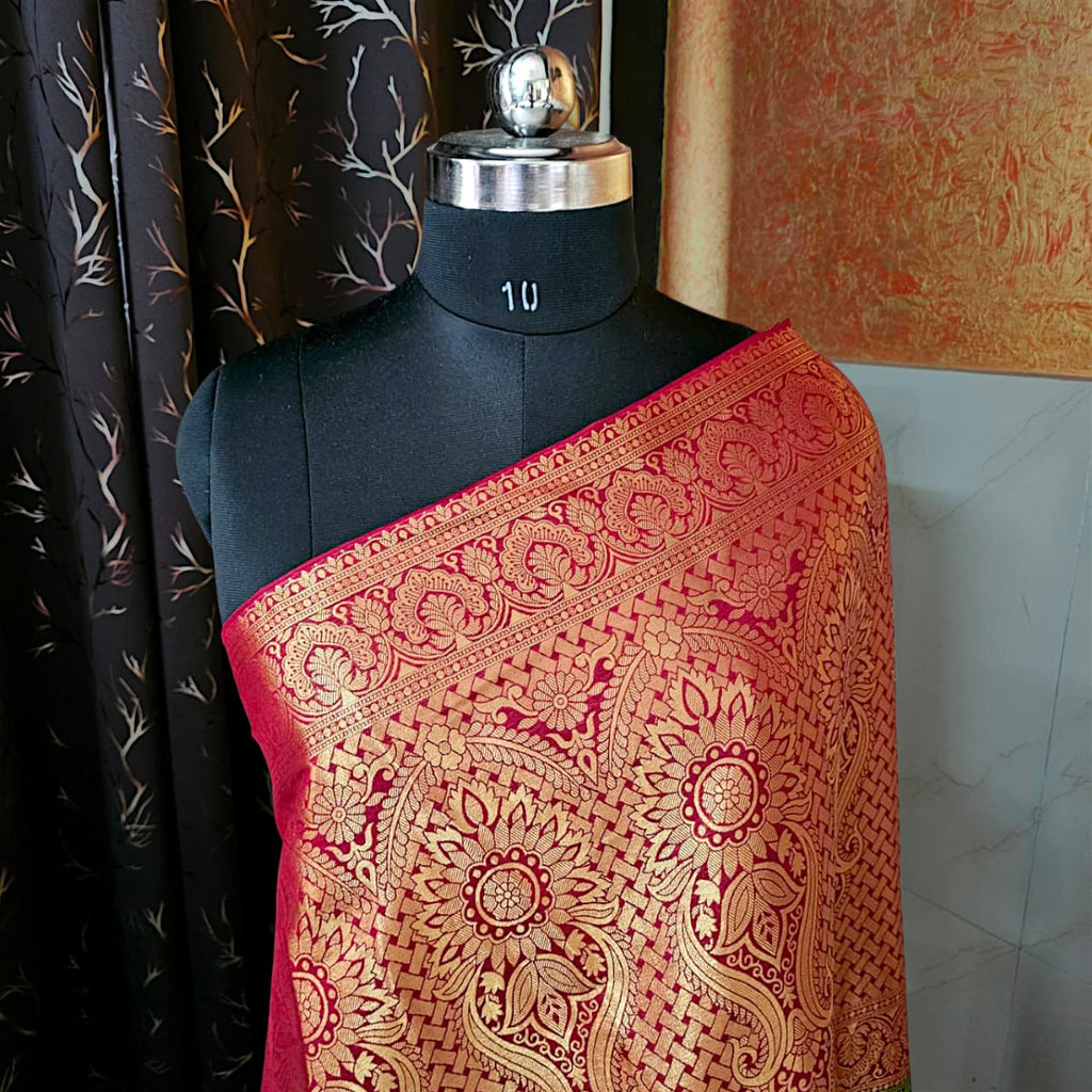 “Green dupion silk saree with contrasting red border, traditional festive wear”