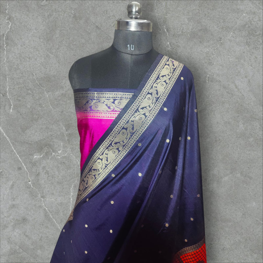 "Stunning Dupion Silk Saree with a vibrant navy blue and pink contrast, featuring intricate golden zari weaving, a checkered multi-color pattern, and a richly designed broad border, perfect for festive and traditional occasions."