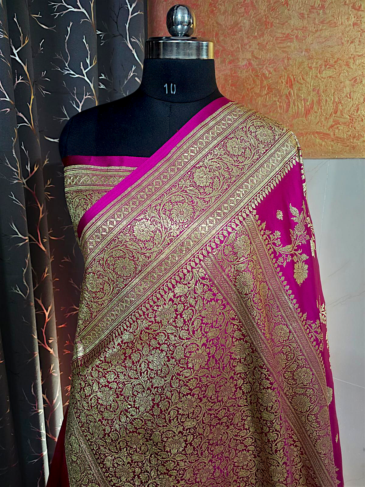 Royal rani color Banarasi silk saree with bridal embroidery and heavy pallu"
